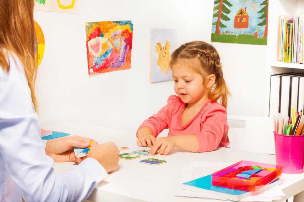 Girl using communication board